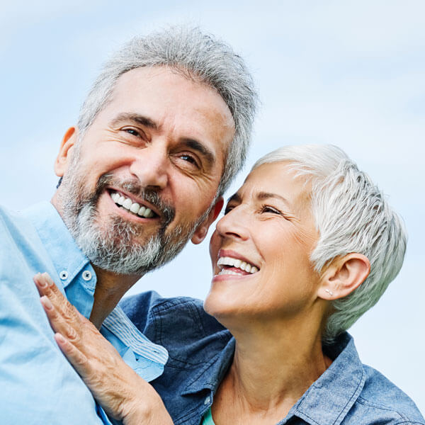 portrait of happy smiling senior couple outdoors