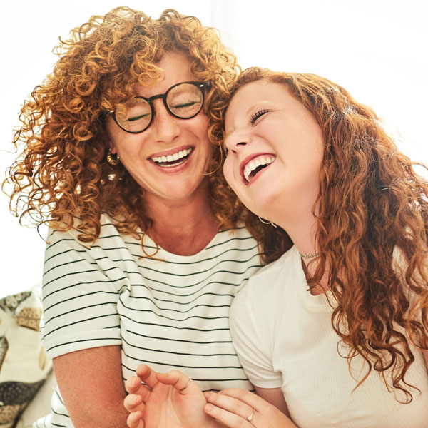 happy mother and daughter spending some quality time together at home